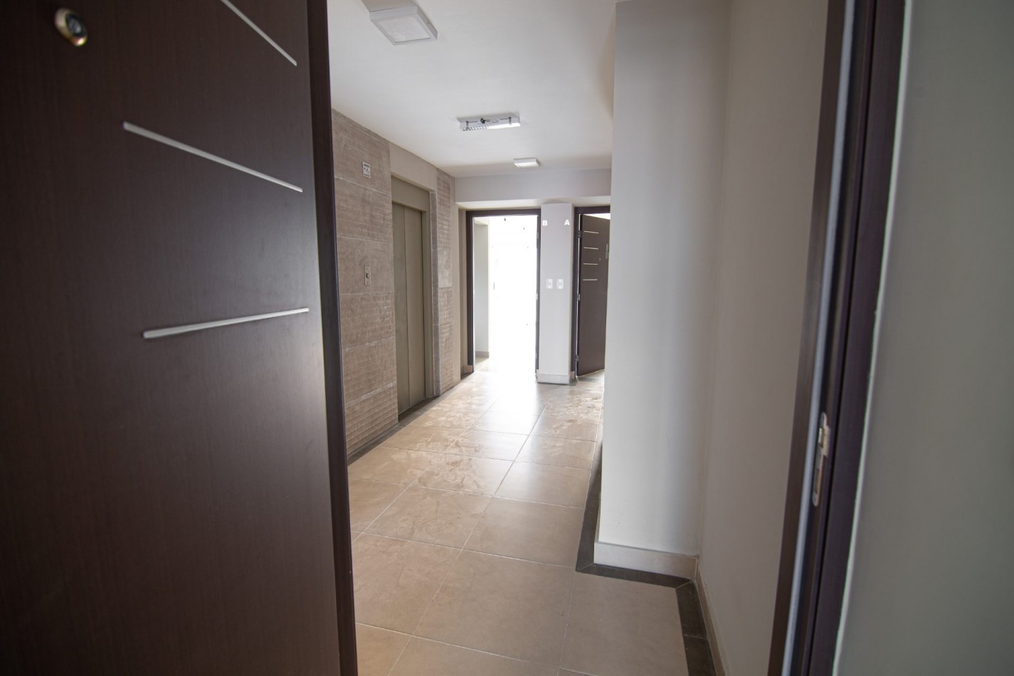 1 Dormitorio C con patio - Edificio Miraggio