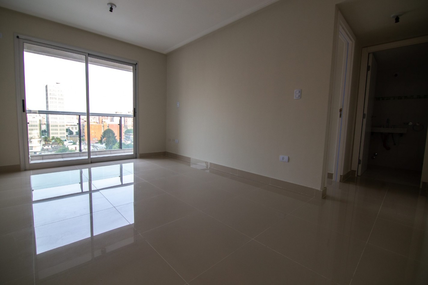 1 Dormitorio C con patio - Edificio Miraggio